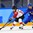GANGNEUNG, SOUTH KOREA - FEBRUARY 18: Japan's Haruna Yoneyama #10 pulls the puck away from Sweden's Emilia Ramboldt #10 during classification round action at the PyeongChang 2018 Olympic Winter Games. (Photo by Matt Zambonin/HHOF-IIHF Images)

